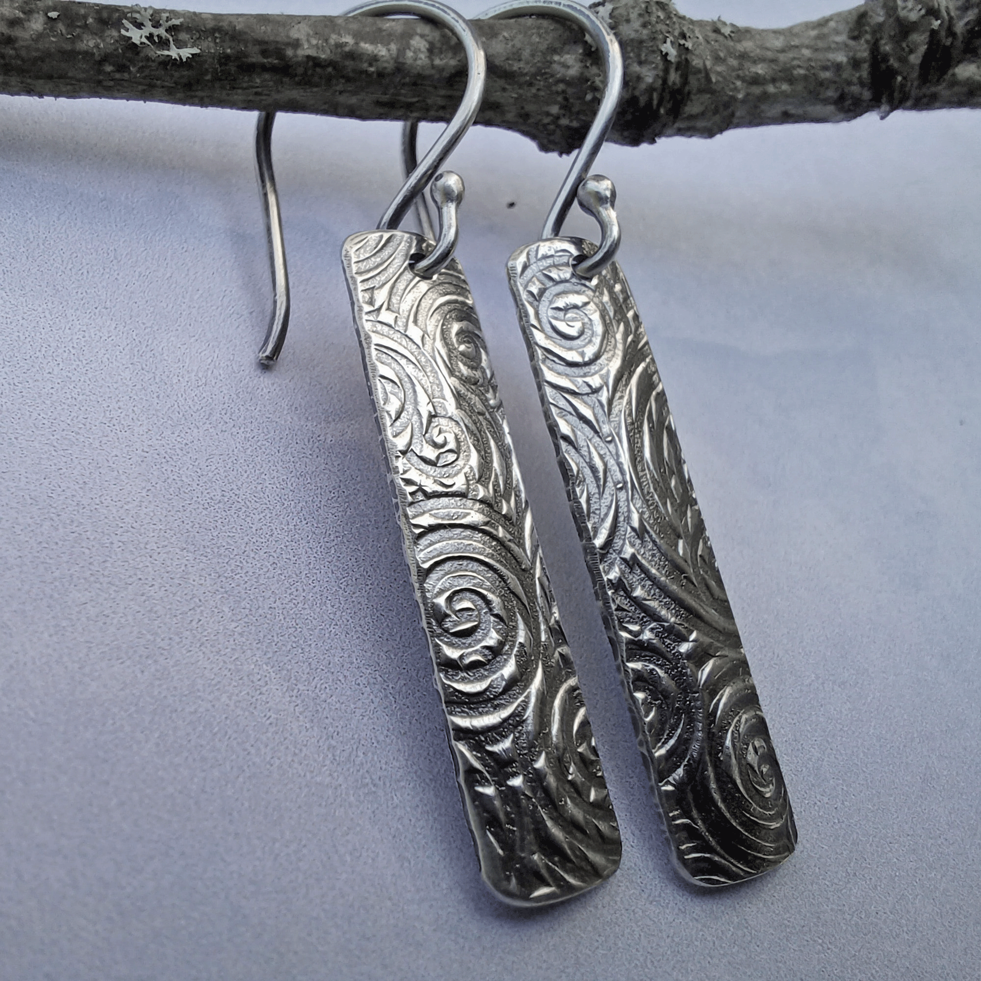 Sterling silver rectangle earrings with ancient spiral pattern and dark patina