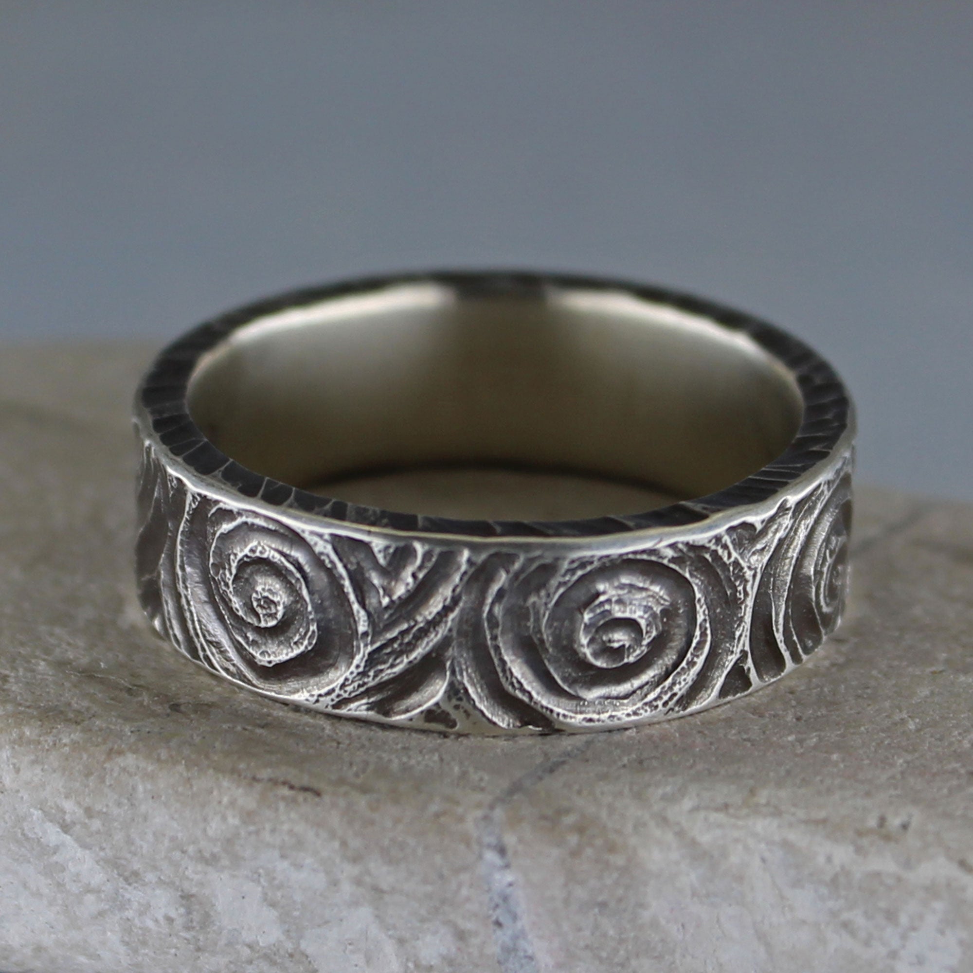 Hand carved sterling silver spiral ring with dark patina, 6 mm wide