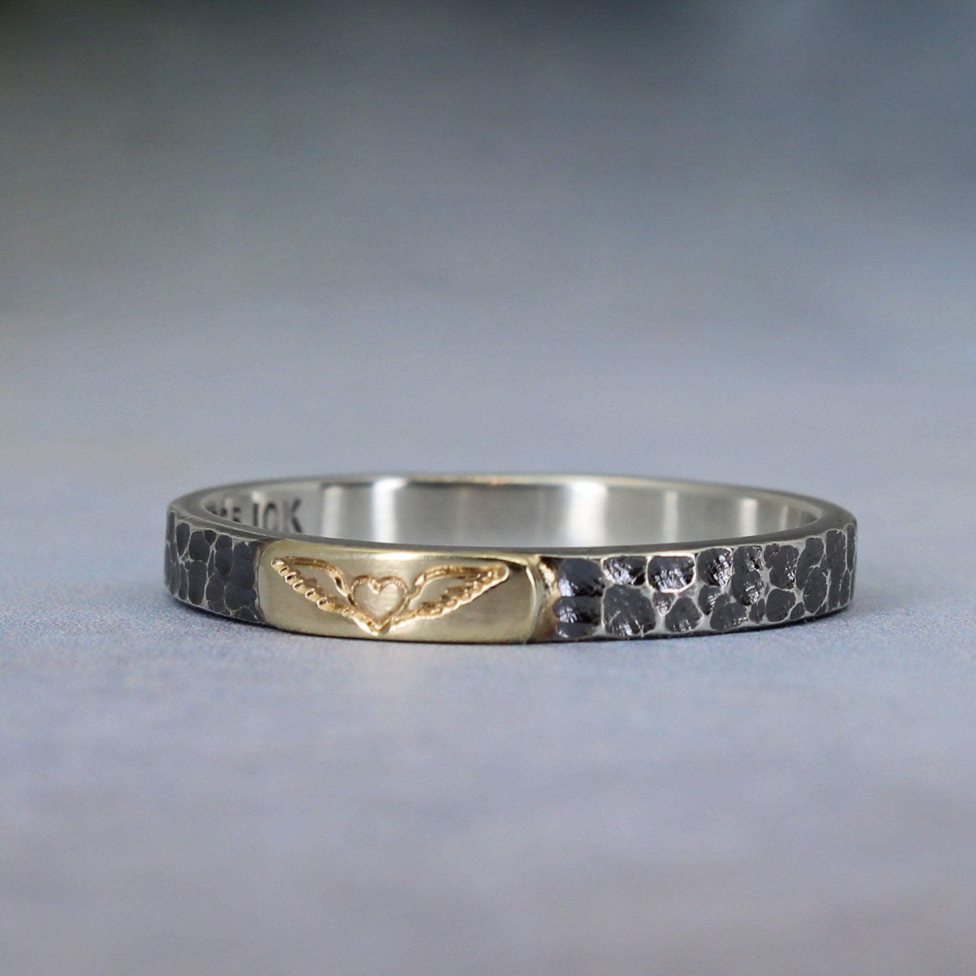 Winged heart stacking ring in sterling silver and 10k gold