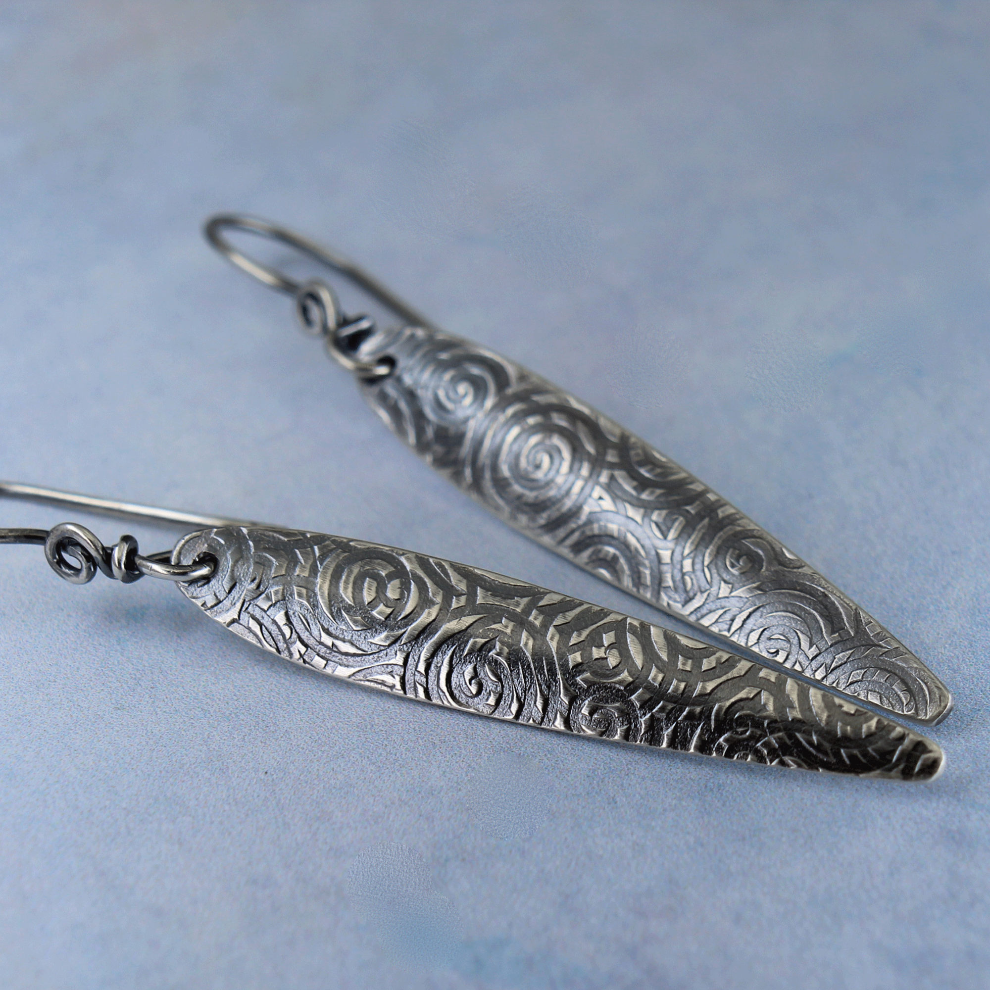 Spiral pattern spear earrings in sterling silver