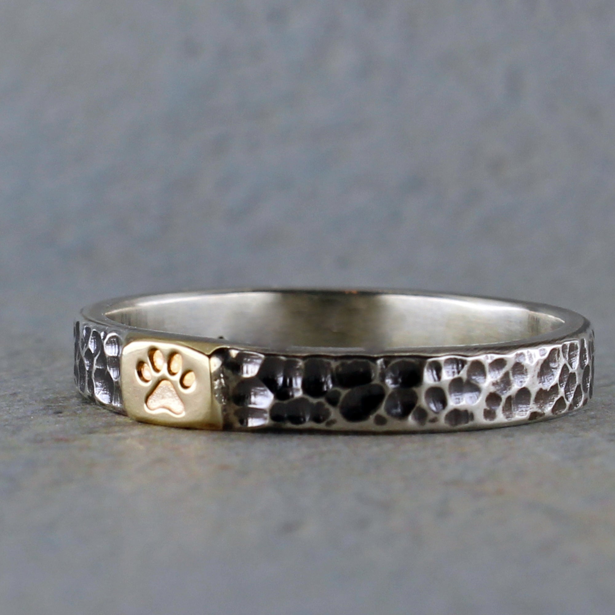 Stackable paw print ring with dark oxidized finish