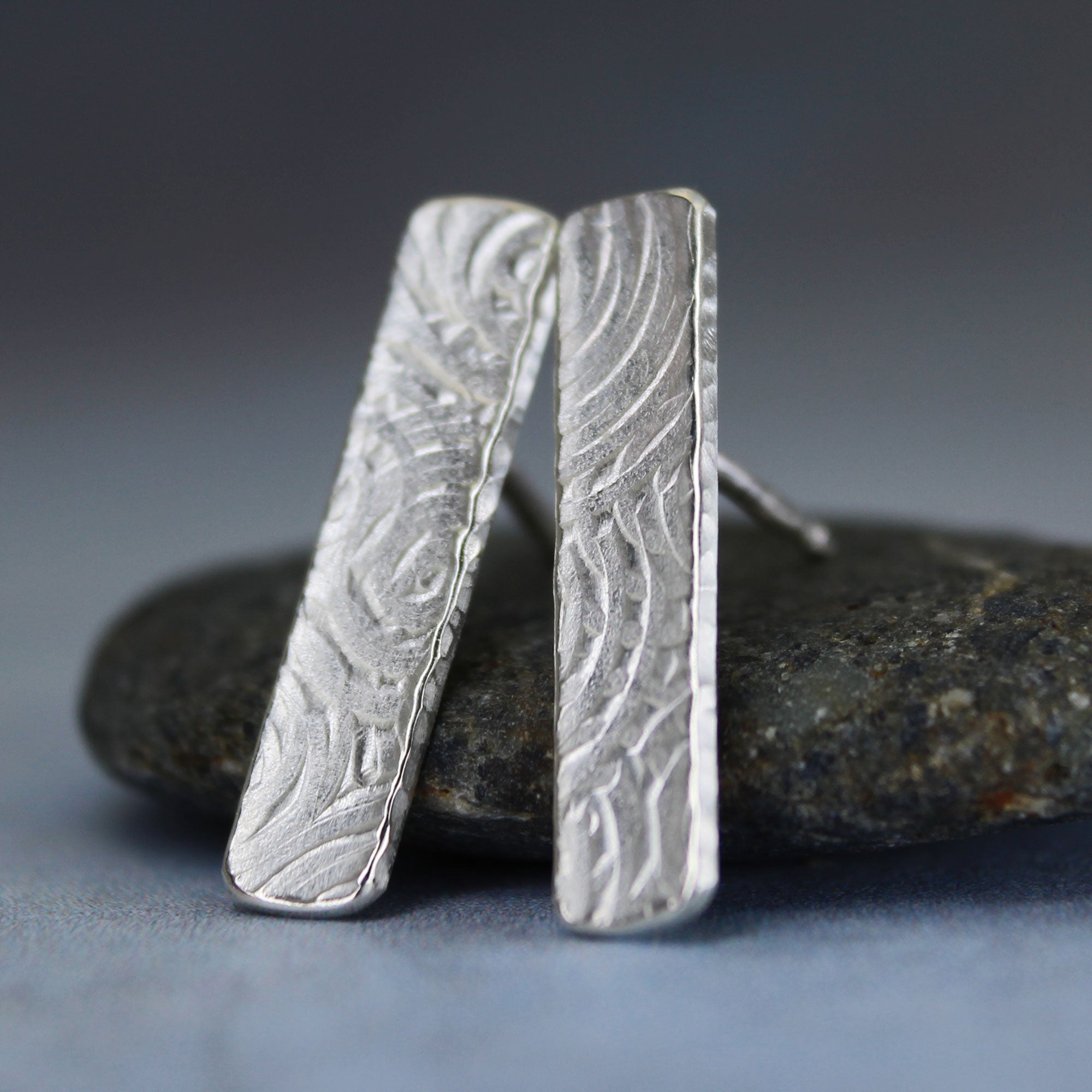 Rectangle stud silver earrings embossed with ancient spiral design