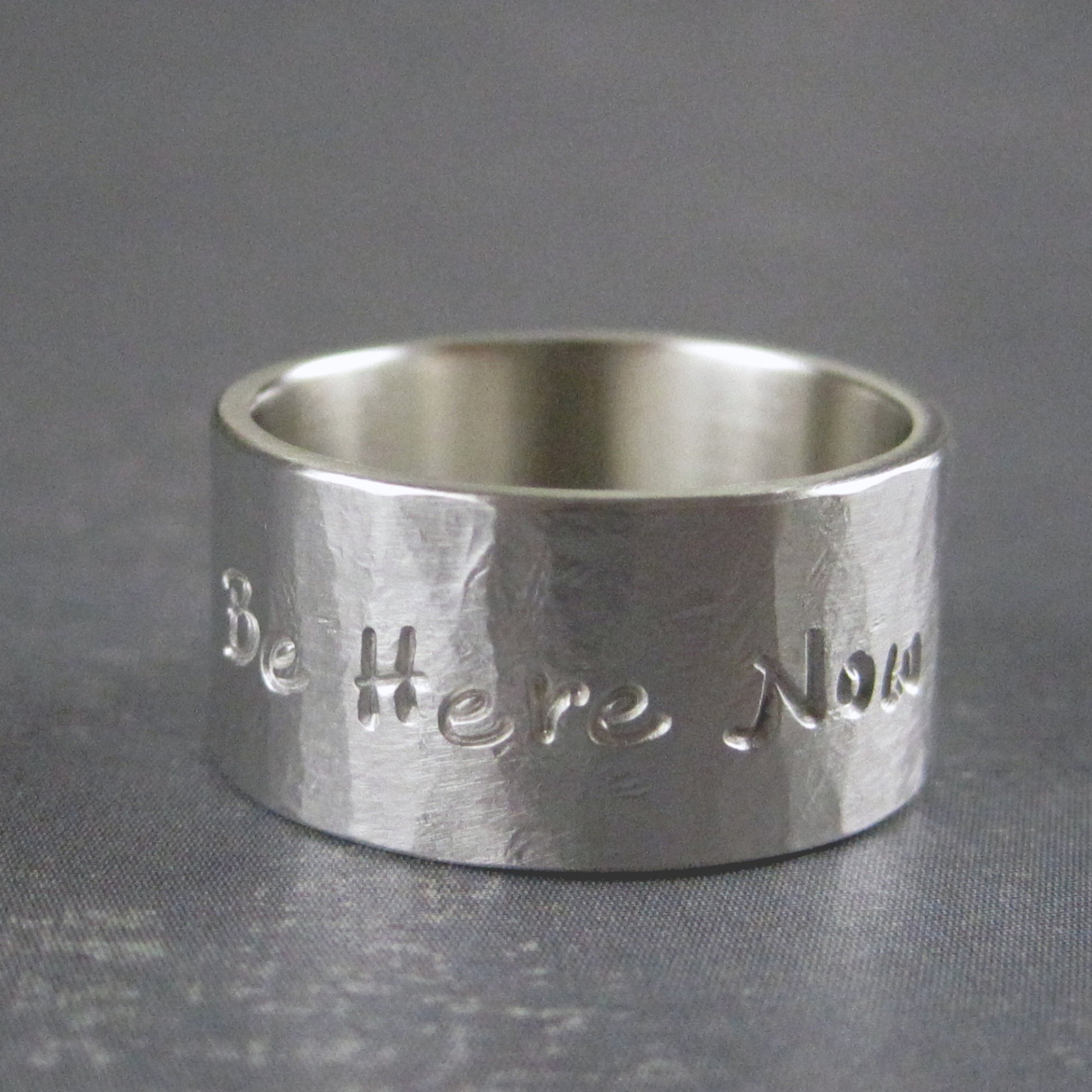 Silver ring with example of personalized inscription