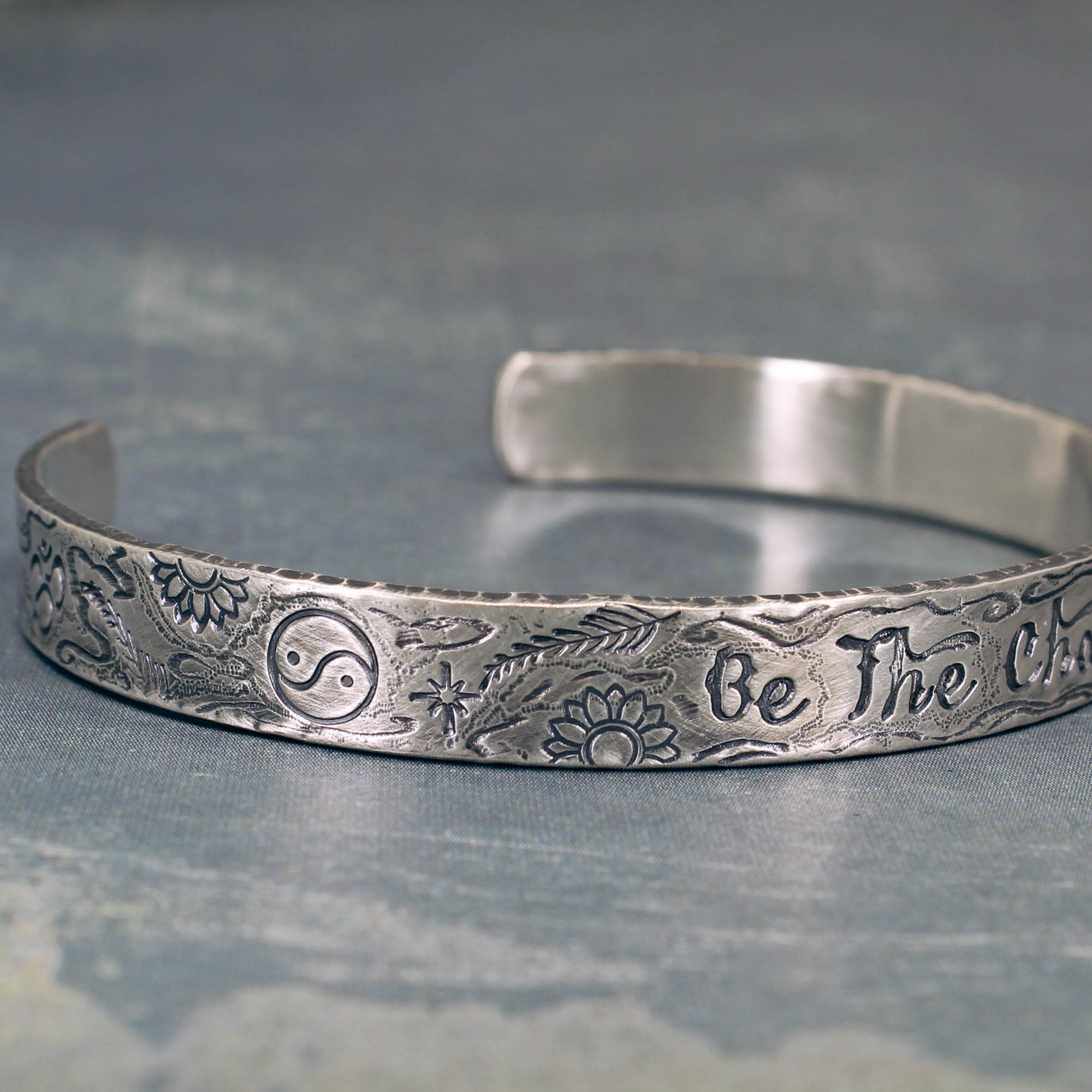 Inspirational silver bracelet with inscription Be The Change