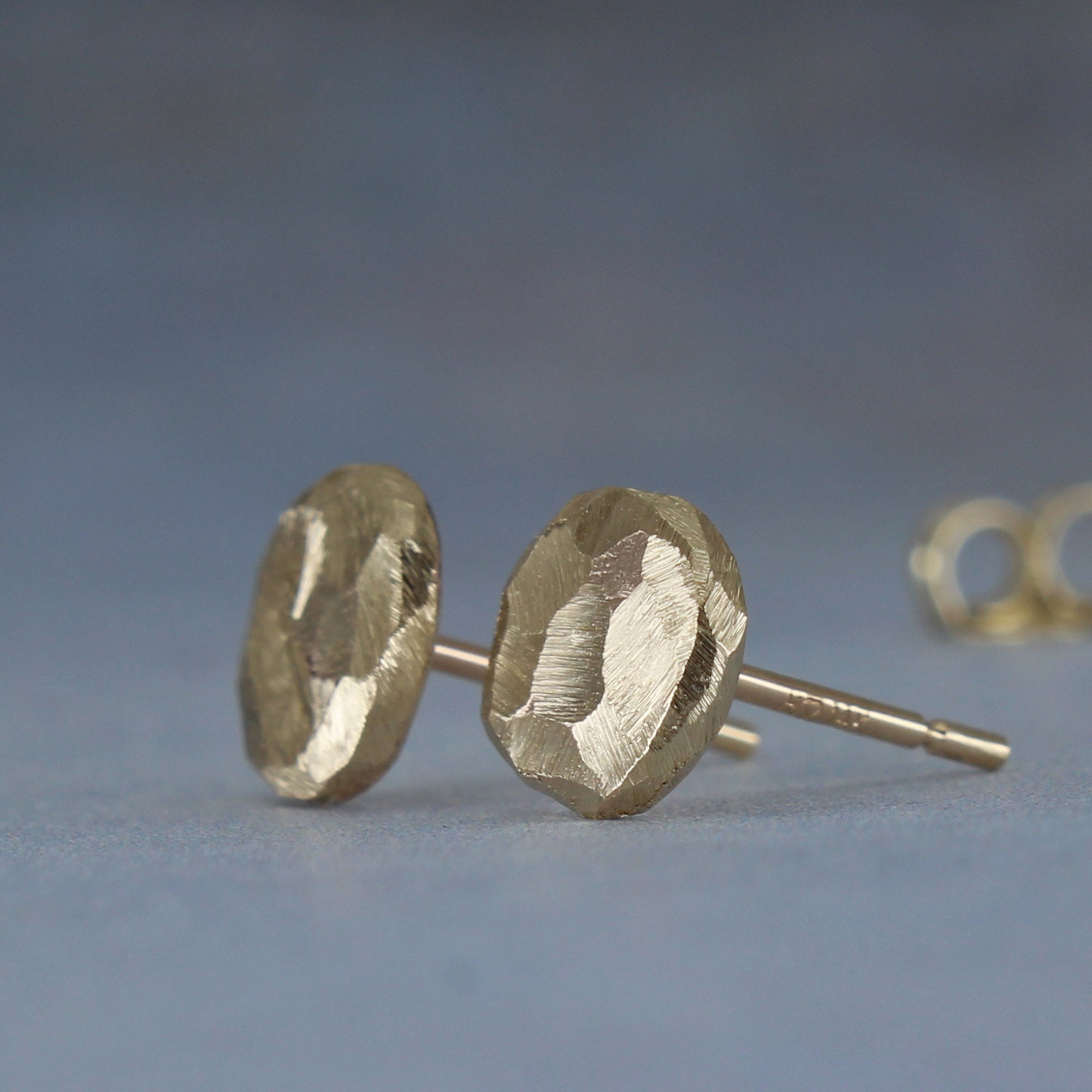 Sideview of 14k mens stud earrings