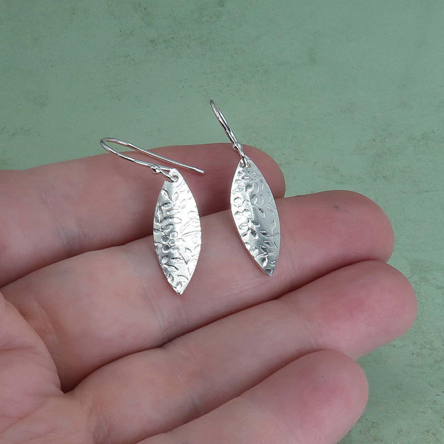 Dangly leaf earrings in sterling silver