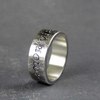 Love conquers all silver ring