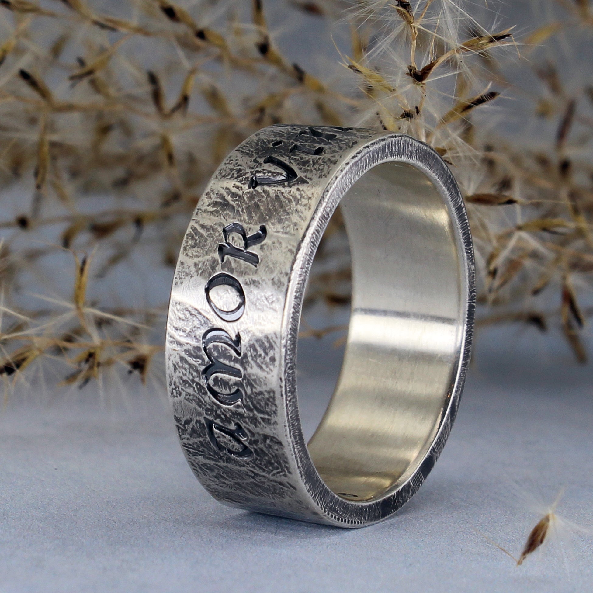 Rustic silver ring with Latin inscription