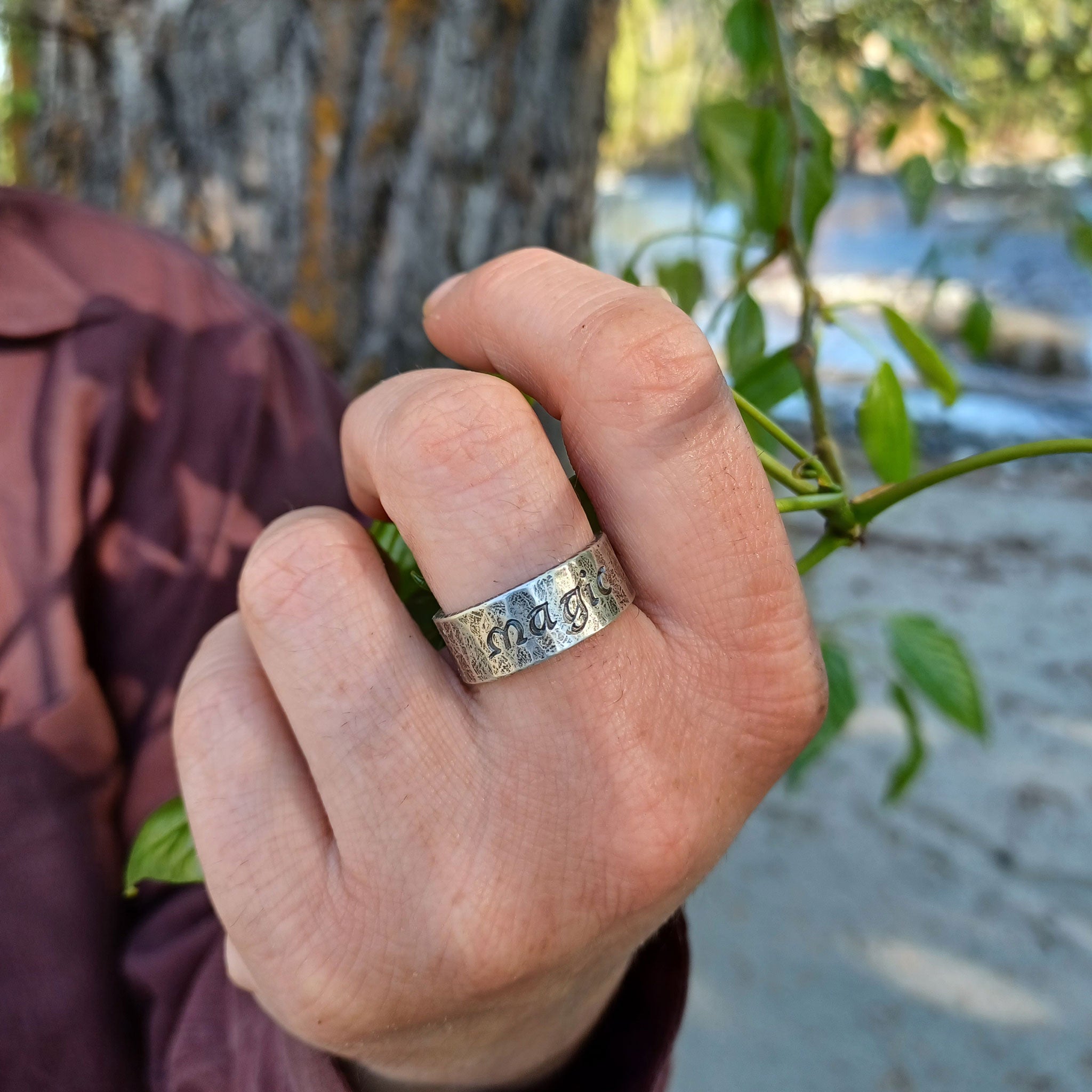 sterling silver inscription ring worn on hand