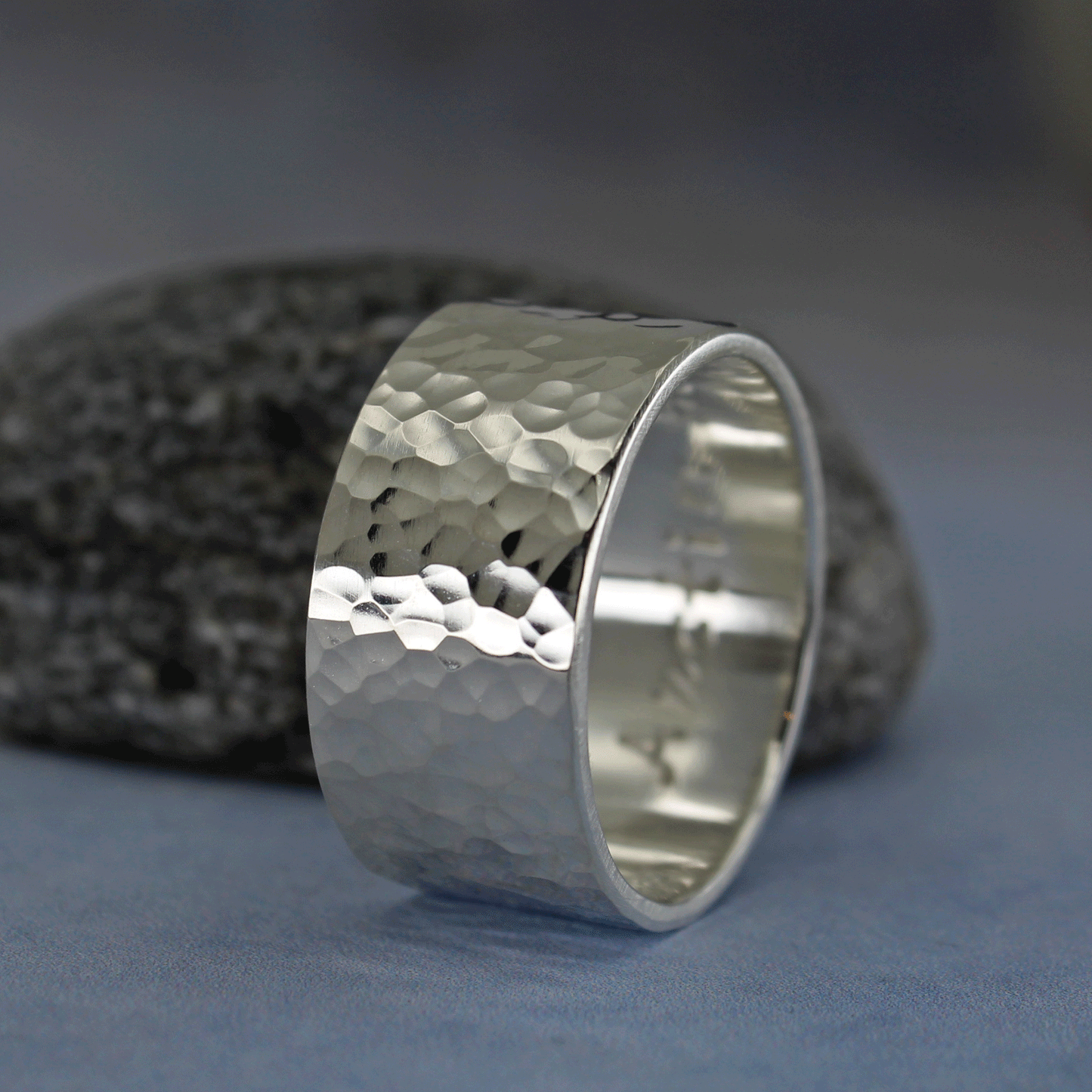 Wide hammered sterling silver ring