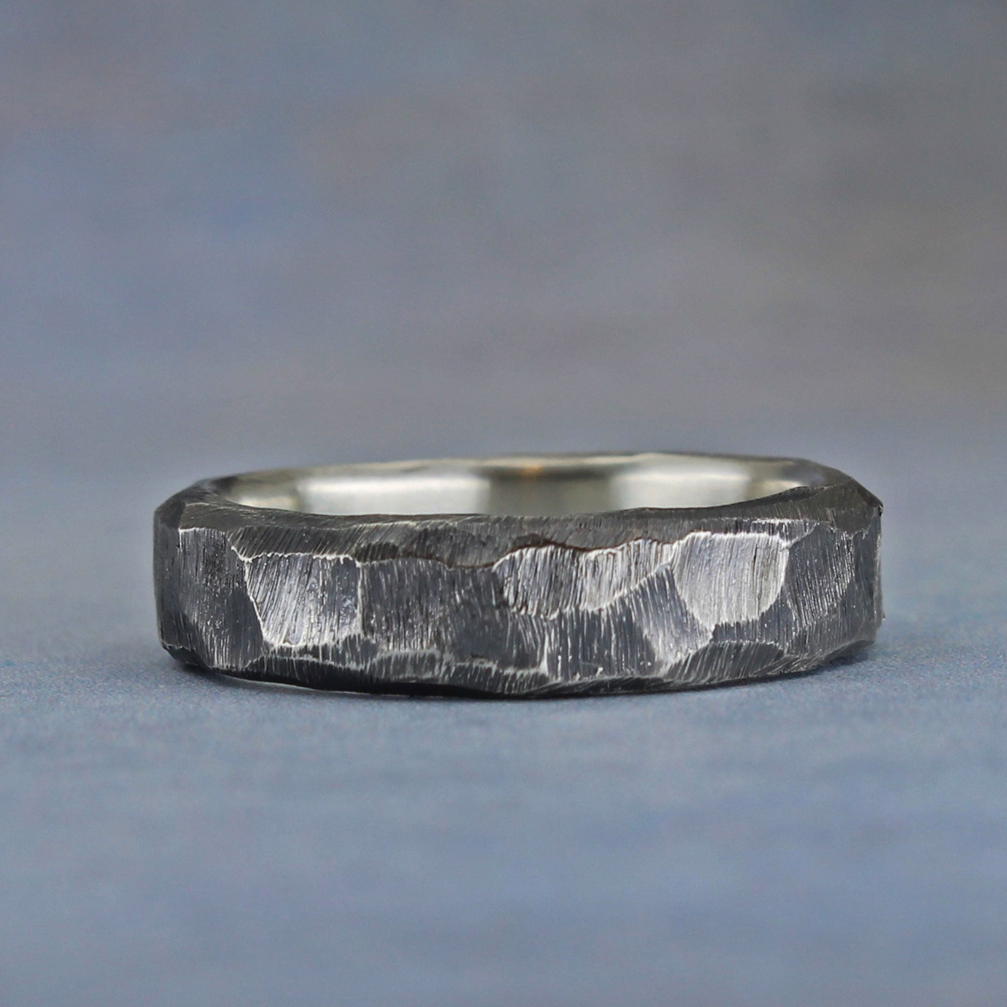 Rustic sterling silver band with rough-hewn texture