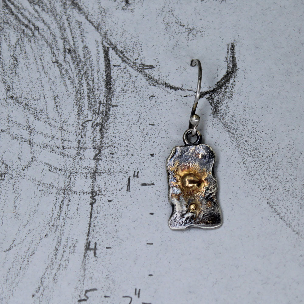 Earring shown on hand drawn earring model with measurements