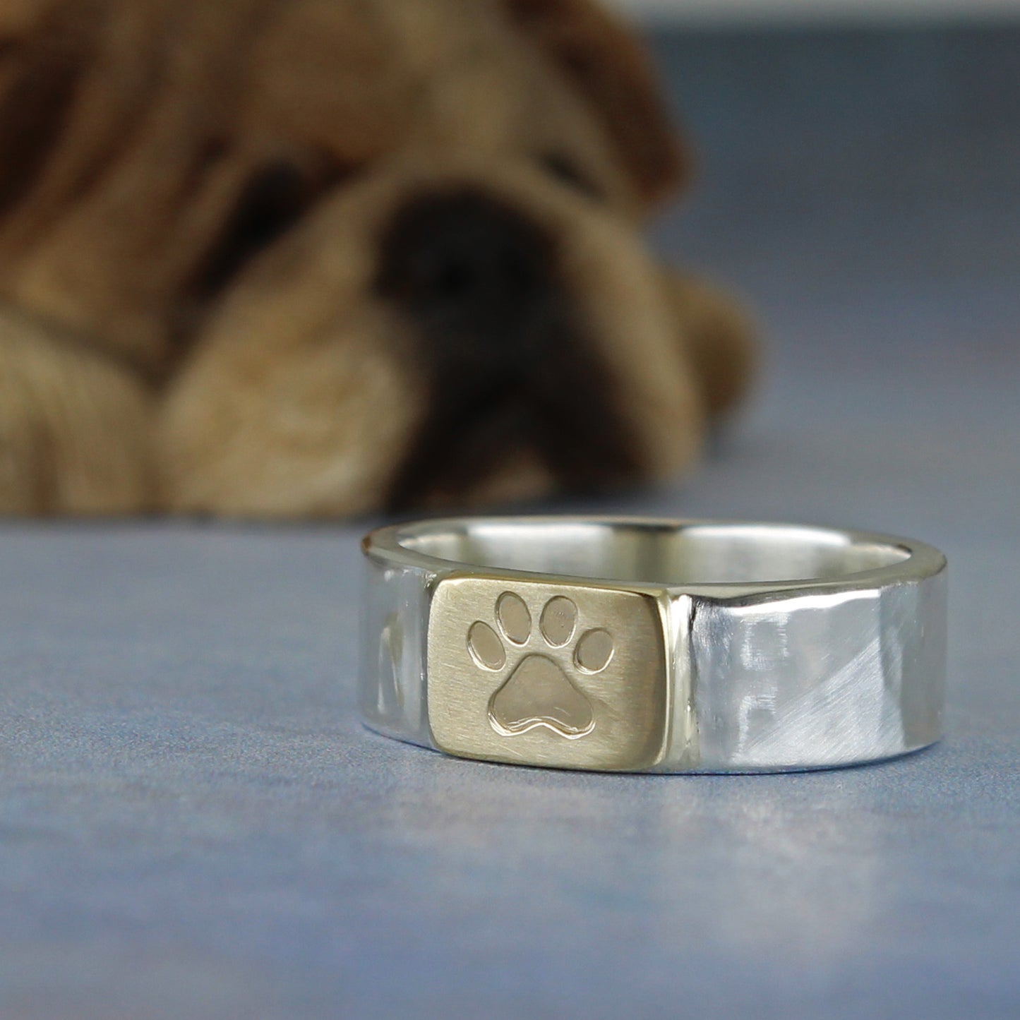 paw print ring handmade in silver and gold