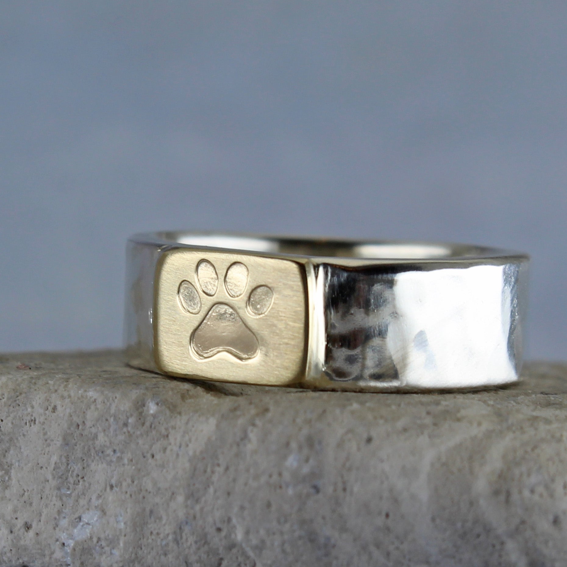 6mm paw print ring made from silver and 10k gold