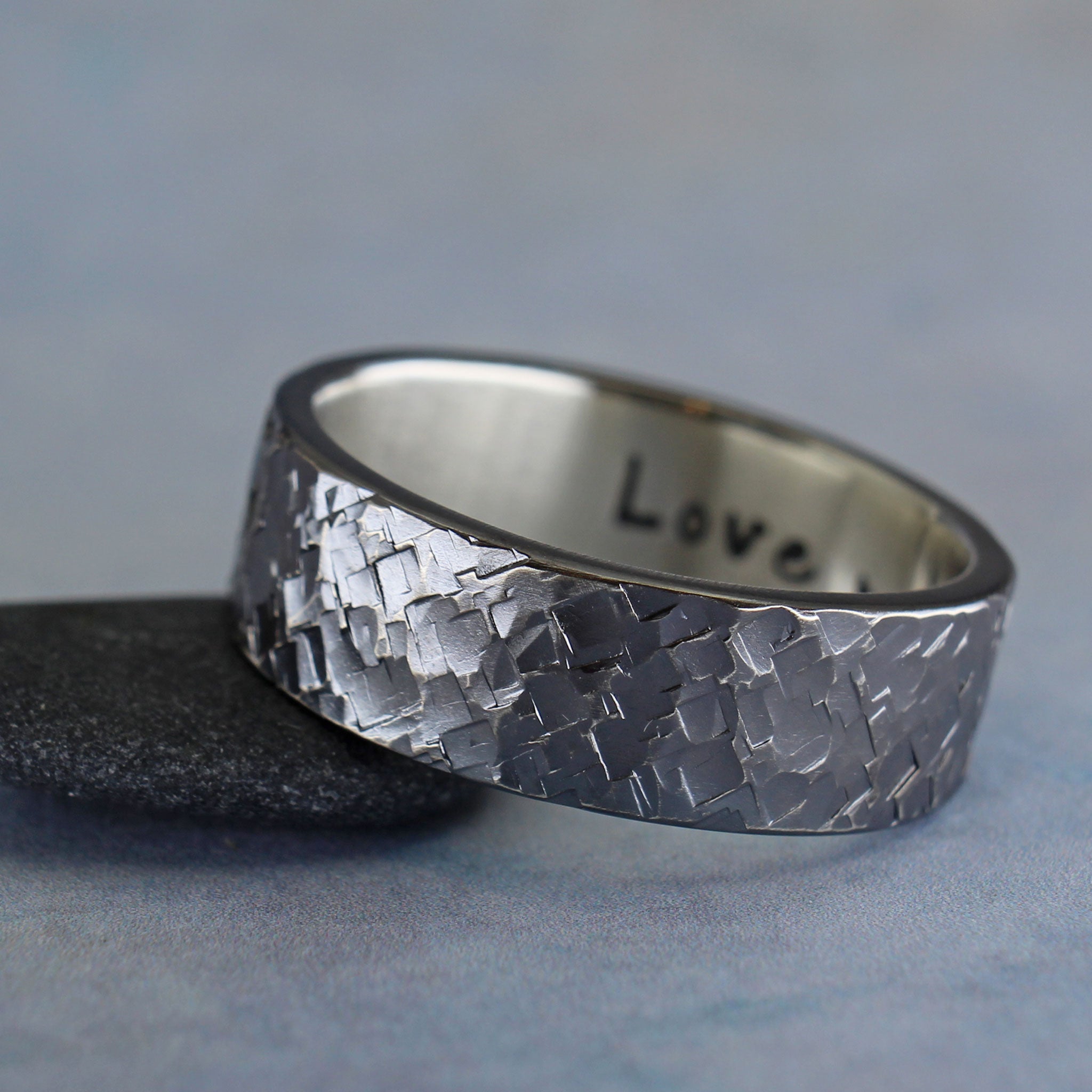 Rugged hammered sterling silver ring with personalized inscription
