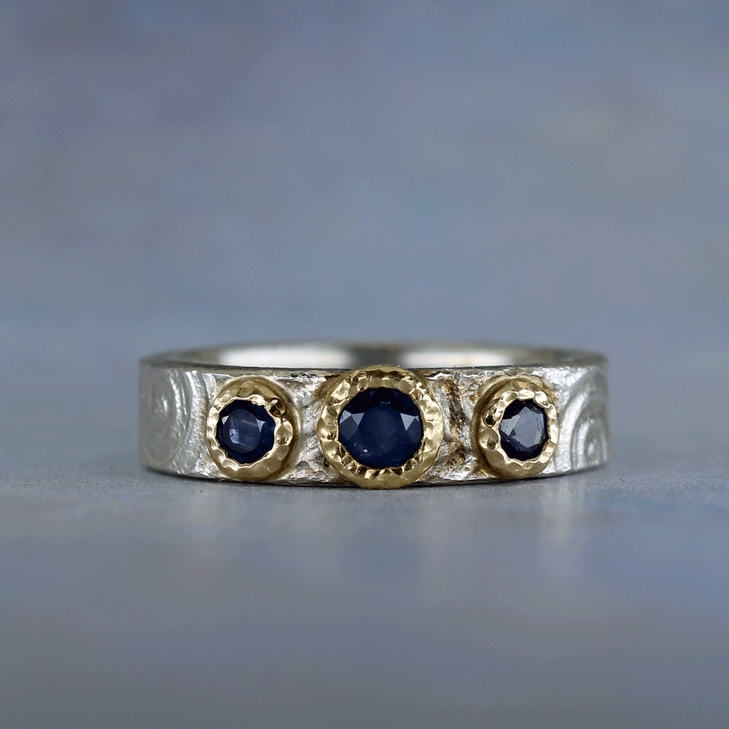 Spiral carved sapphire ring