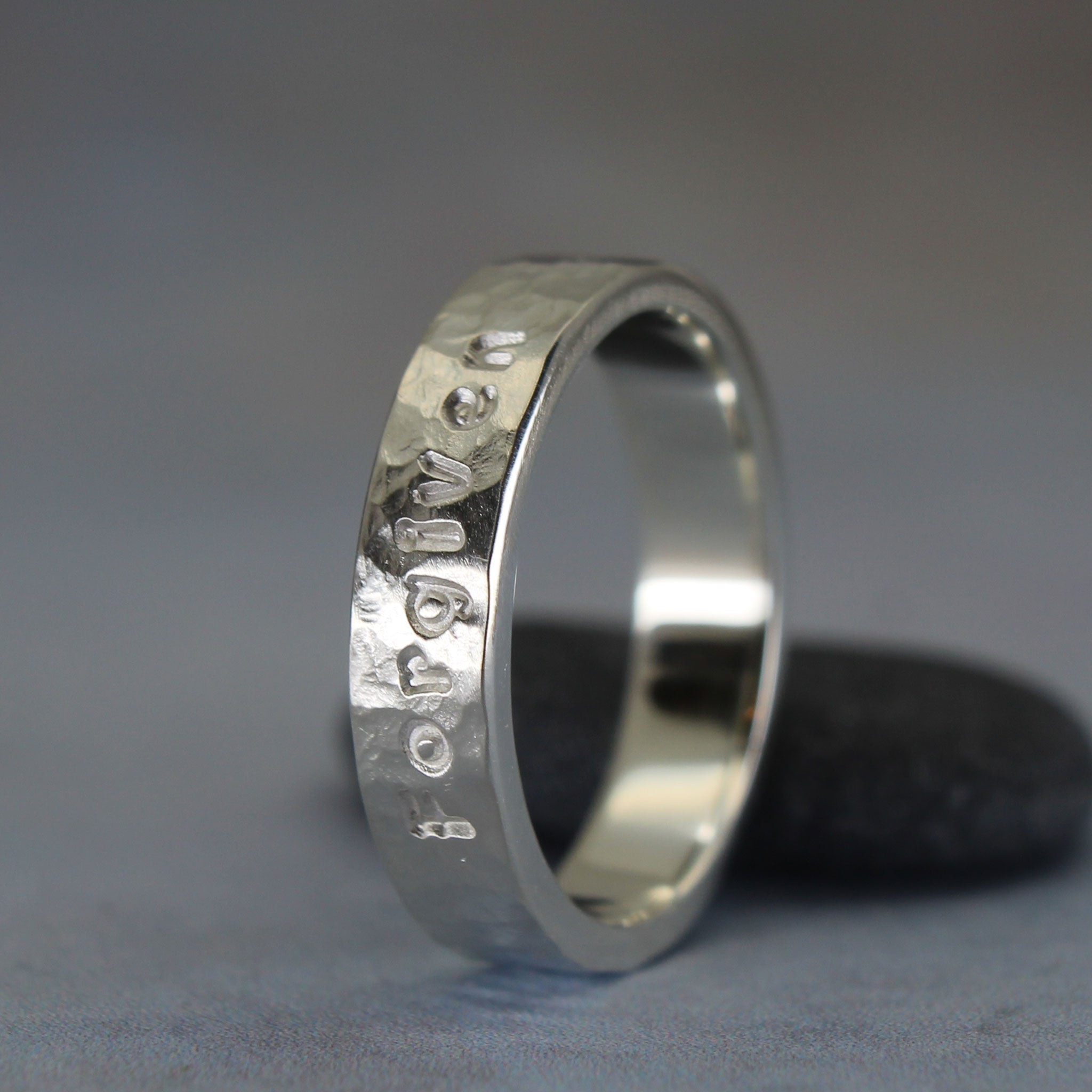 Handcrafted sterling silver ring with custom inscription