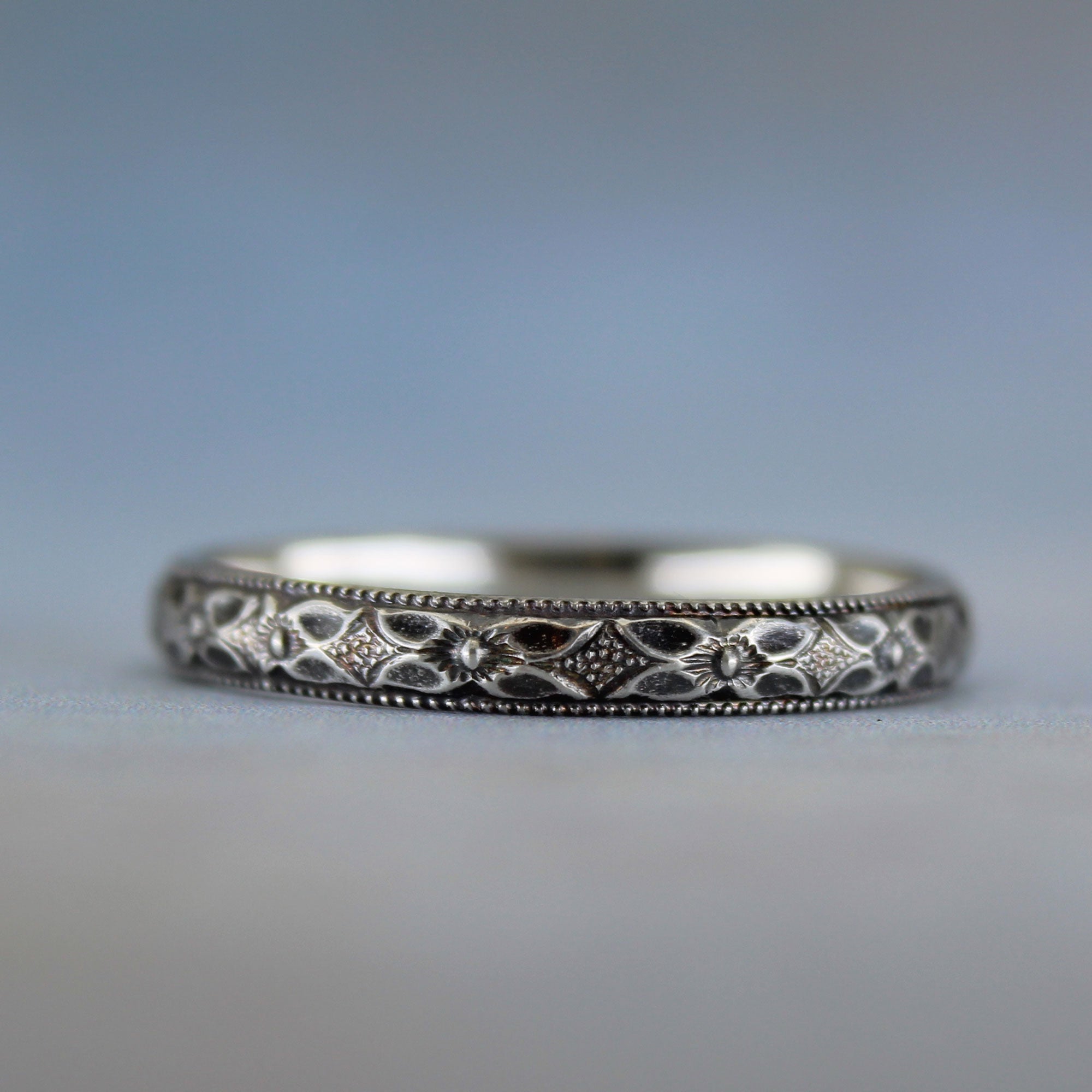Oxidized flower pattern stacking ring