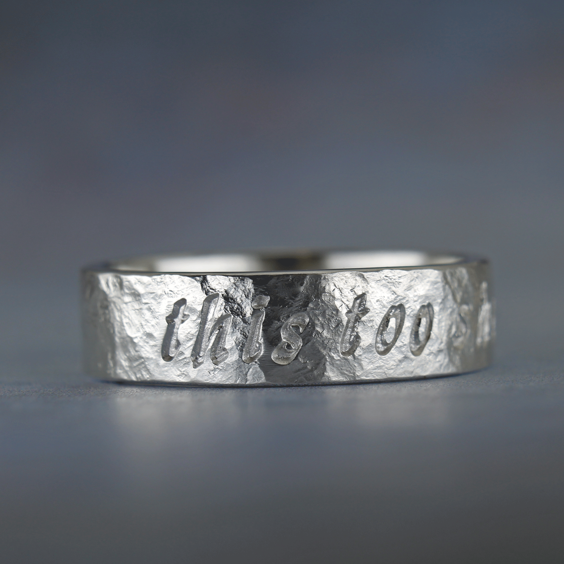 Sterling silver ring with the inscription this too shall pass, 6mm wide