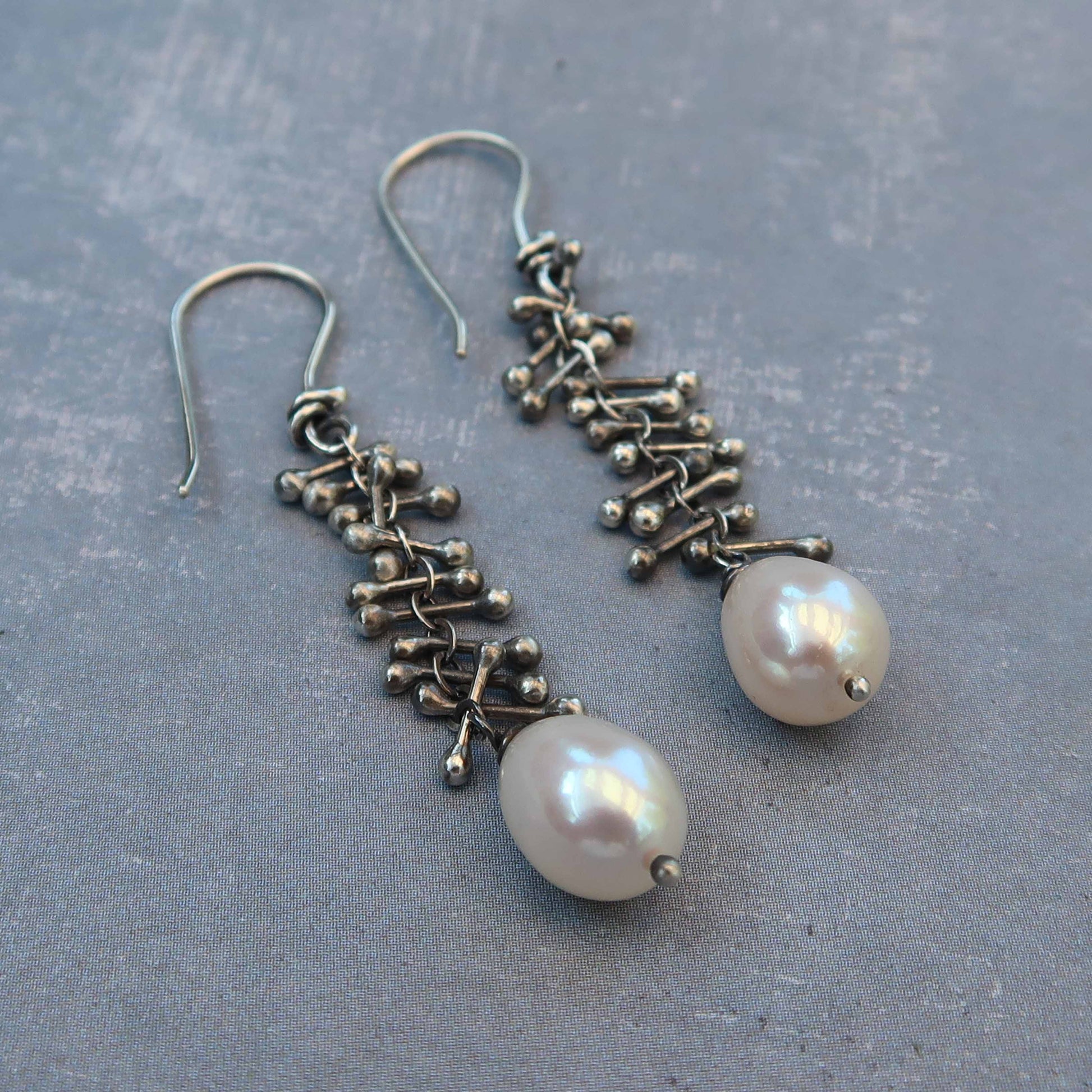 Sterling silver earrings with white pearls