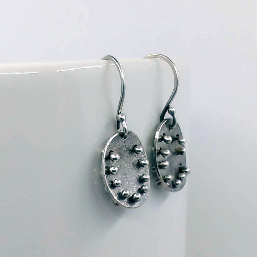 Moon pebble oval earrings