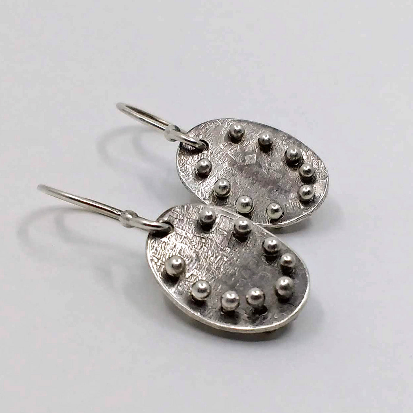 Edgy silver dangle earrings