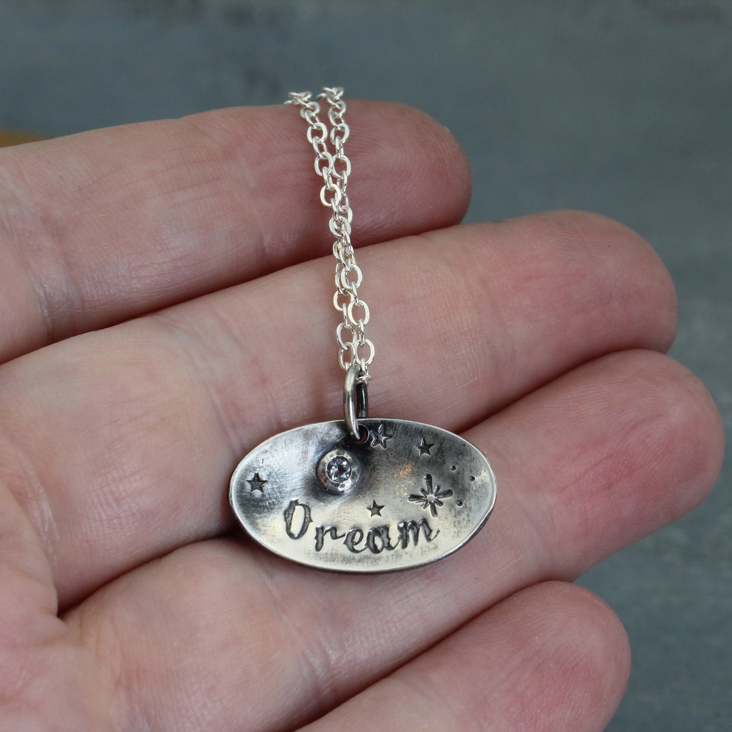 Dream necklace on hand