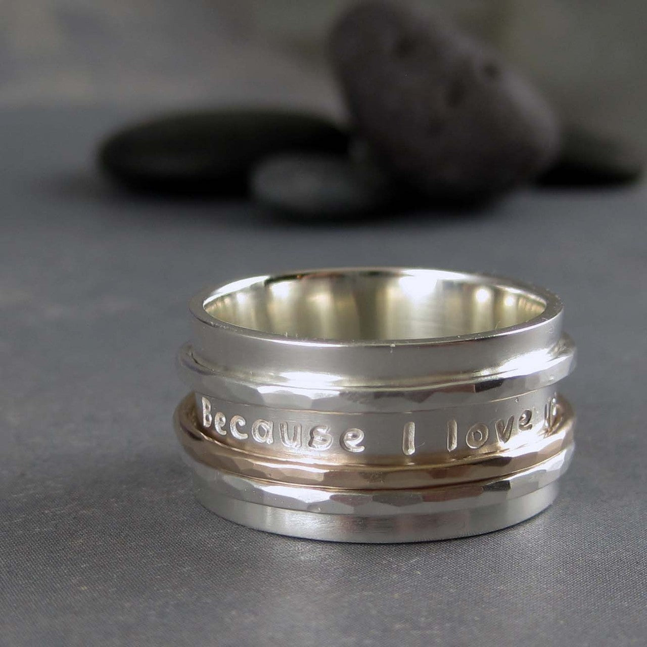 gold and silver spinner ring