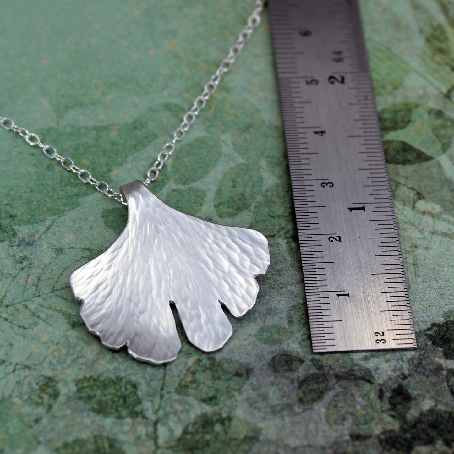 Leaf pendant with ruler