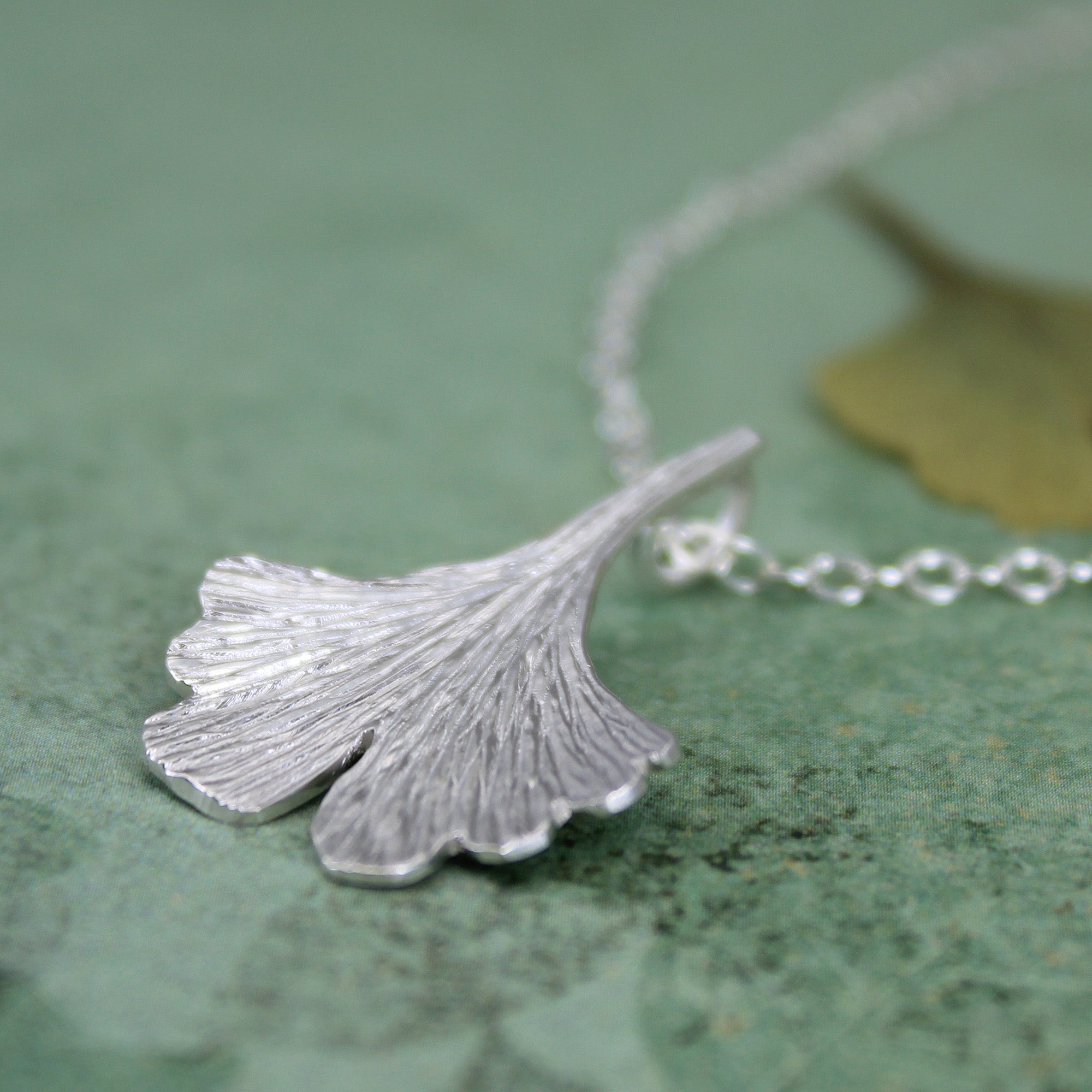 Small ginkgo leaf necklace in sterling silver