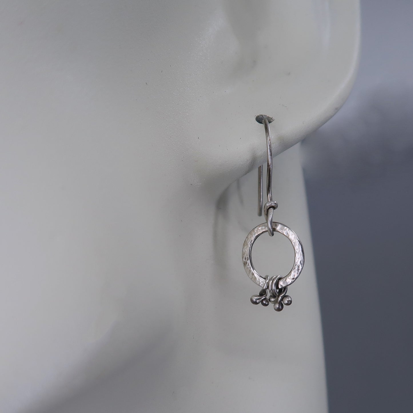 Tiny silver hoops with silver pebbles