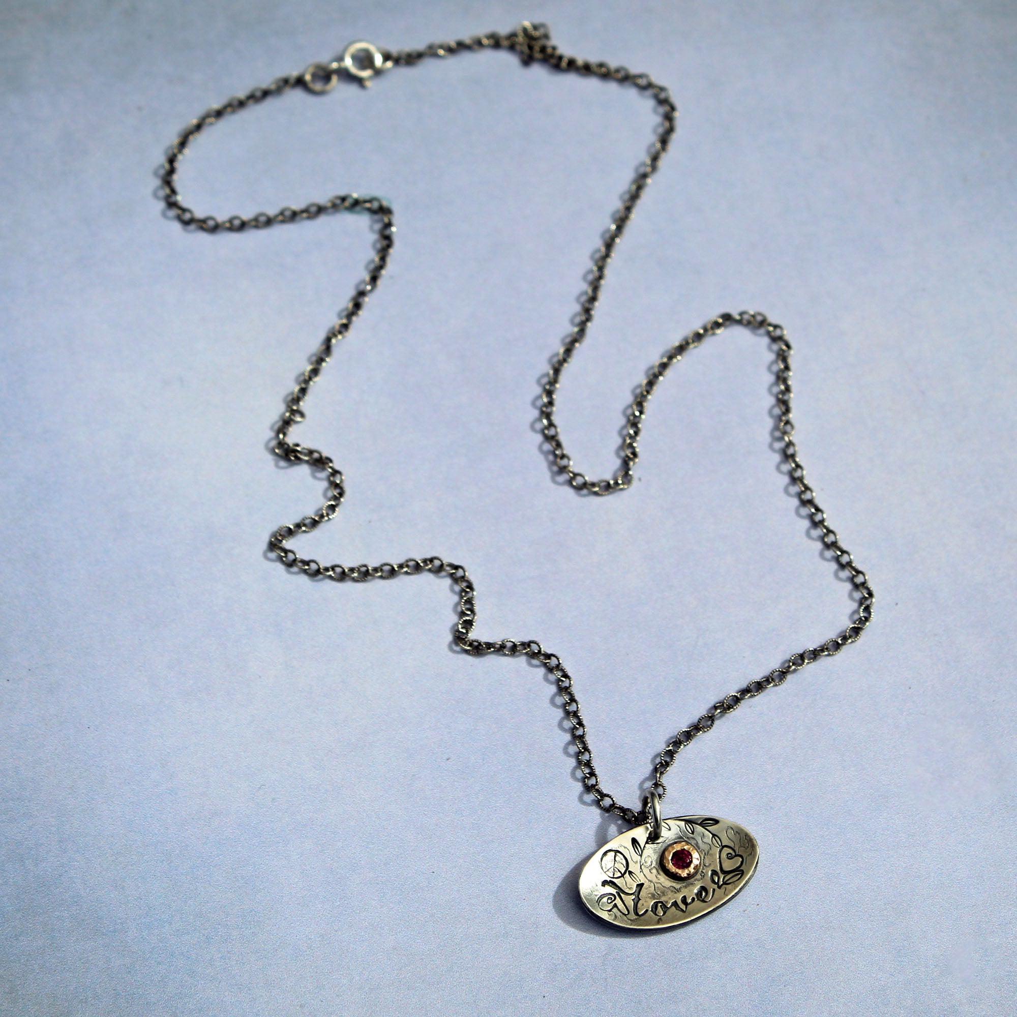 Boho necklace with garnet in gold