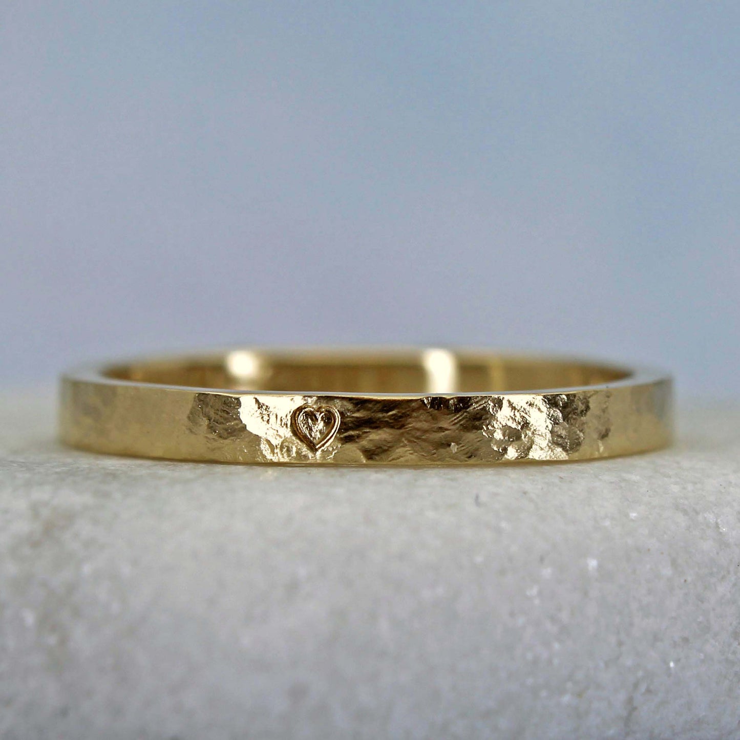 14k stacking ring with a rustic hammered finish and a little heart stamp.